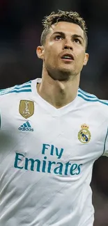 Mobile wallpaper of a soccer player wearing a white jersey.