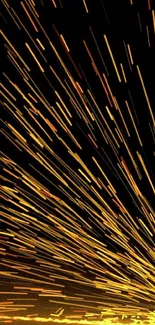 Dynamic golden spark streaks on a dark background, creating an energetic wallpaper.