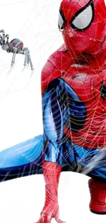 Dynamic Spider Hero in red and blue suit with web design on white background.