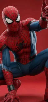 Dynamic Spider-Man in action on red background.