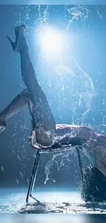 Artistic water dance with a dynamic pose against a blue backdrop.