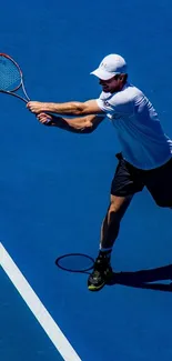 Tennis player hitting a ball on a blue court during an action-packed moment.