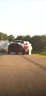 A powerful red truck speeding down a scenic road with smoke trails.