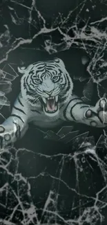 White tiger breaks through cracked glass in artistic phone wallpaper.