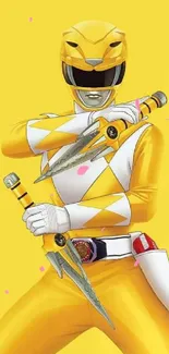 Yellow Ranger striking a pose on vibrant yellow background.