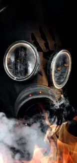 Dystopian gas mask with flames and urban reflections on a mobile wallpaper.