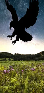 Eagle silhouette flying over a flower field under a starry night sky.