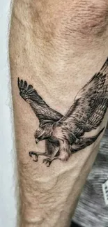 Eagle tattoo on forearm with detailed design.