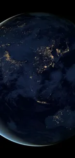 Night view of Earth from space showing glowing cities.