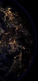 Night view of Earth from space with illuminated cities.