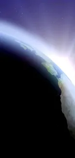 View of Earth from space with sunrise in the distance.