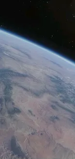 A stunning view of planet Earth from space with a starry backdrop.