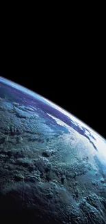 Curved view of Earth from space against a black starry background.