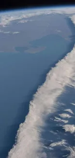 Earth view from space with clouds and oceans, perfect for wallpapers.