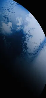 A serene Earth view with blue curvature on black background, perfect for phones.