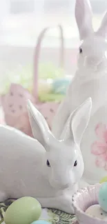 Ceramic Easter bunnies with pastel eggs and floral accents.