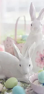 Ceramic bunnies with pastel eggs and floral accents for Easter.