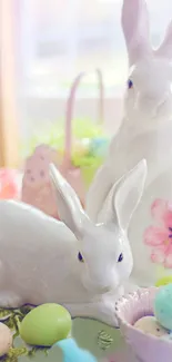 Porcelain bunnies with pastel eggs and flowers, perfect for Easter wallpaper.