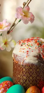 Easter cake with colorful eggs and spring blossoms.