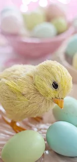 Charming wallpaper of a fluffy chick with pastel Easter eggs.