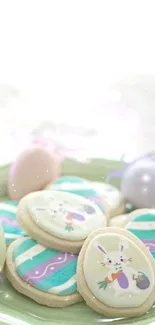 Easter-themed wallpaper with cookies and pastel eggs on a green plate.