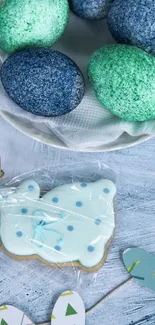 Vibrant Easter eggs and a fish-shaped cookie with pastel colors.