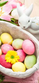 Colorful Easter eggs in a basket with flowers and a white rabbit figurine.