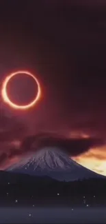 Eclipse and mountain under a dark sky.