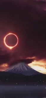 A dramatic solar eclipse over a mountain with a vibrant, dark sky.