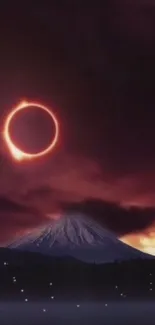 Dark sienna sky with eclipse over mountain.