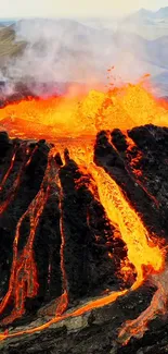 Vivid orange lava flow from an erupting volcano.