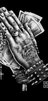 Gothic praying hands with bills and beads on black background wallpaper.