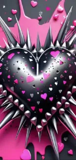 Black heart with spikes and pink accents wallpaper.