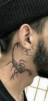 Mobile wallpaper of a scorpion neck tattoo on a man wearing a beanie.