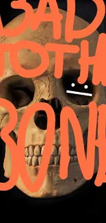 Skull with 'Bad to the Bone' text in orange on a black background.