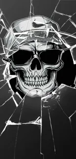 Skull with shattered glass effect on a dark background wallpaper.