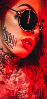 Edgy red wallpaper with tattoos and sunglasses for alternative style lovers.