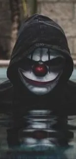 Hooded clown face emerging from dark water.