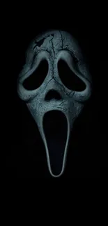 Dark Ghostface mask on black background.