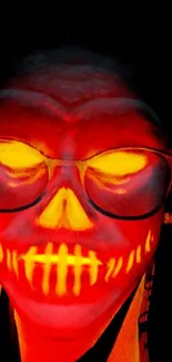 Eerie glowing skull with red hues and dark background.