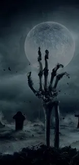 Creepy graveyard with skeletal hand under moonlight.