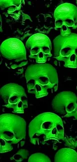 Neon green skull pattern wallpaper with dark background.