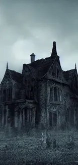 Eerie haunted house under a full moon on a foggy night.