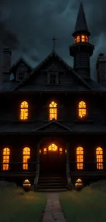 Dark and eerie haunted house with glowing windows at night.