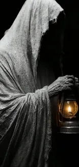 Hooded figure holding a glowing lantern.