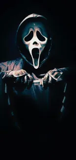 Eerie hooded mask against dark background.