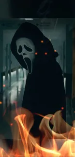 Dark, hooded figure with flames in eerie corridor background.