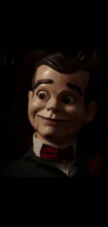 Creepy puppet in dark setting, eerie wallpaper.