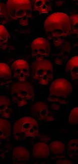 Eerie red skulls create a haunting wallpaper design.