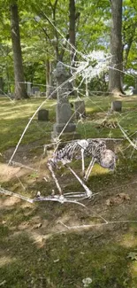 Crouching skeleton in a green forest cemetery.